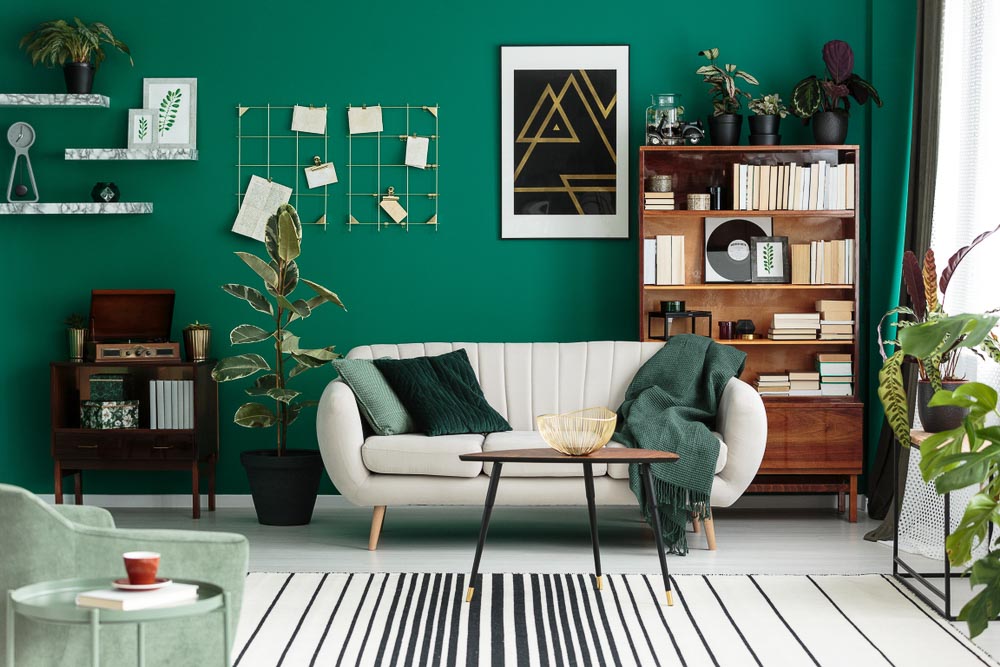 Green Living Room Design With Dark Green Walls & White Floor & Furniture - Beautiful Homes