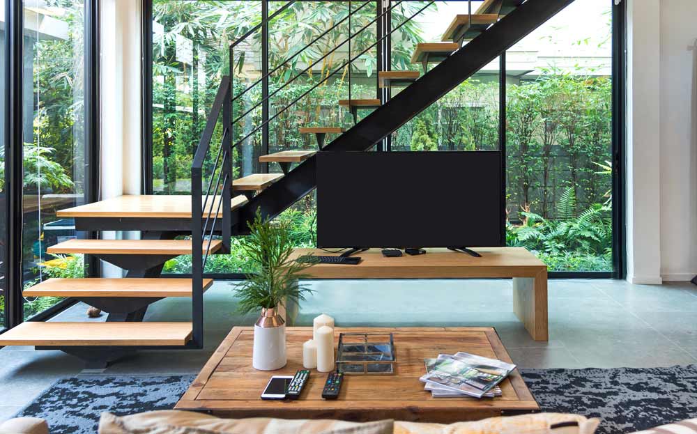 Design your stairway so you can have storage space under the staircase - Beautiful Homes
