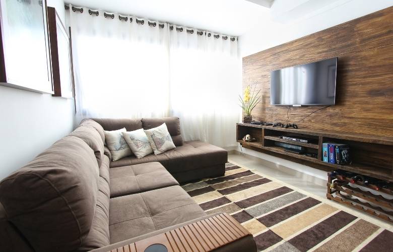 Patterned cushions on the sofa for the comfort in your living room - Beautiful Homes