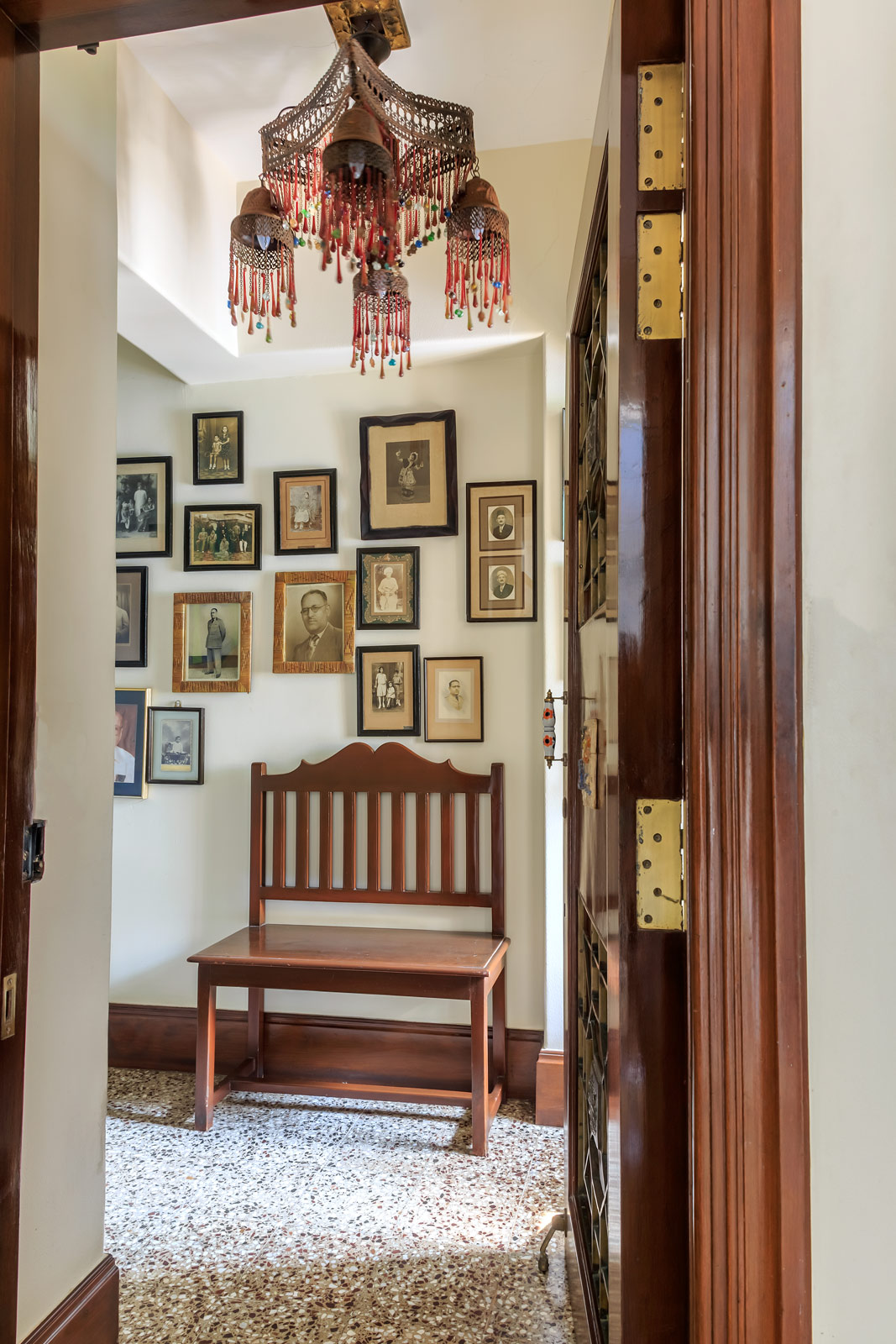 The entryway decorated with an artwork collection - Beautiful Homes