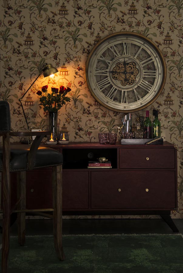 Vintage Home Bar Design In Maroon & Gold, With Printed Wallpaper, Metal Lamp & Clock - Beautiful Homes