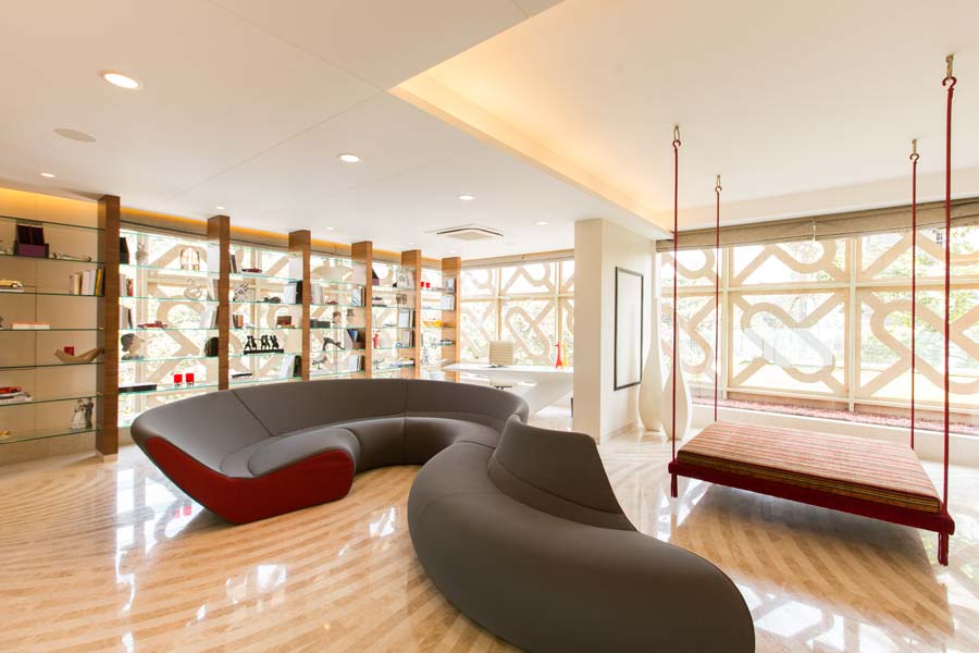 Swirled & Curved Sofa For Modern Living Cum Bedroom Space - Beautiful Homes