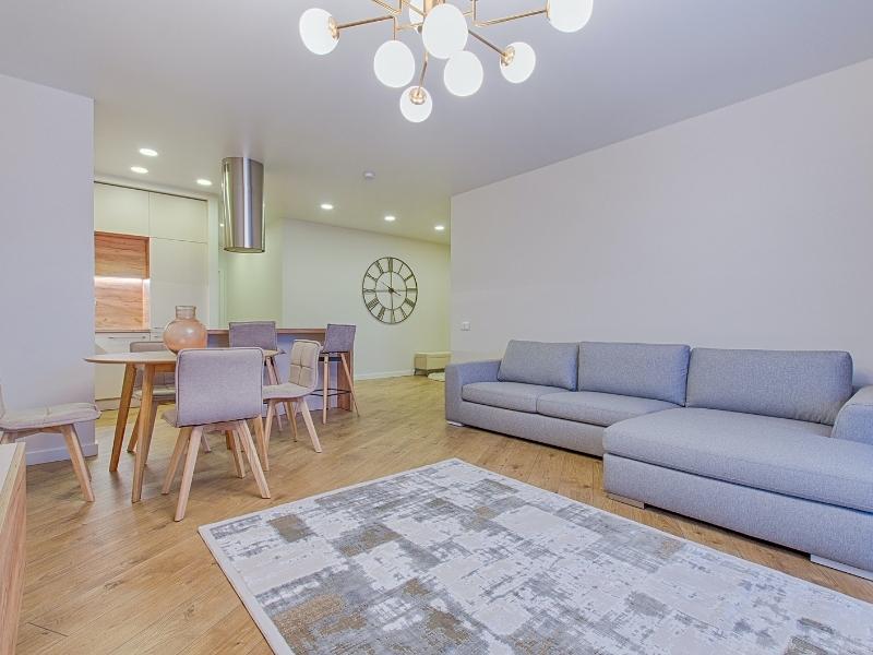 Open concept house with dining table & sectional sofa - Beautiful Homes