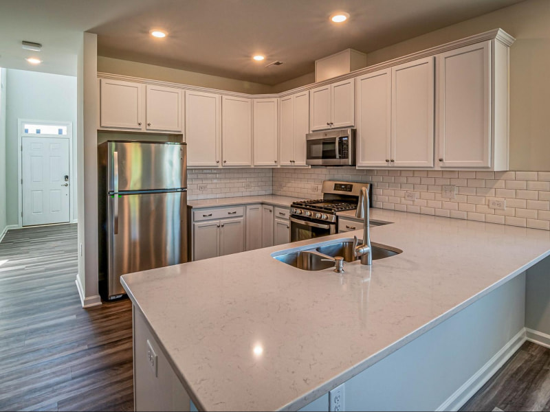 Minimalist kitchen cabinet with wood flooring - Beautiful Homes